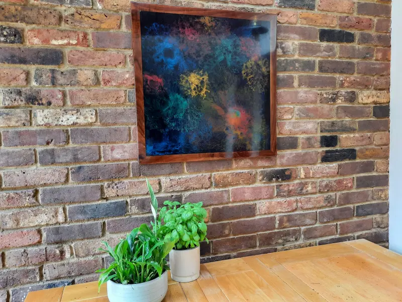 Black resin art in a walnut frame, photo 3 of 10, as taken